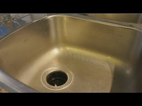 how to fix leak in kitchen sink drain