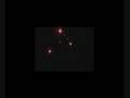 wierd black triangle UFO with red lights. Spaceship?