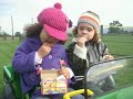 Toddlers enjoying their John Deere Gator!