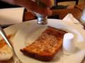 Tyler makes butter at indyish breakfast meeting