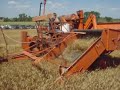 Allis Chalmers 60 combine with bagger at Hutch. Allis Chalmers 60 combine with bagger at Hutch.