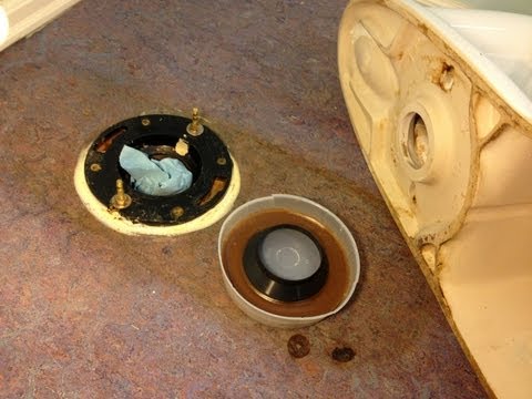 how to fix toilet leak at base