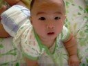 Alex playing on bed