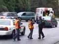 DV-496-1 MAR 28 2006 COQUITLAM MVA POLICE OFFICER HIT BY C