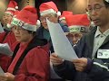 Home care workers sing carols