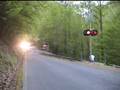 With dynamic brakes whinning, RJ Corman drops downgrade...