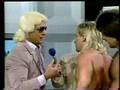 Ric Flair gives Ricky Morton a training bra