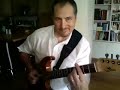 at home practicing chord solo of autumn leaves