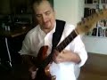 at home practicing chord solo of autumn leaves