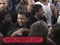 Mungdi Shimar ton' Zainab rida ay, ainj dhi Ali di hoyi ghareeb ay.

Raiya kon baaki kis nu bula vai  ainj dhi Ali di hoyi ghareeb ay.

1)  Maqtal jo aayi ohday vaal khulgaye darbaar aaya ohnu veer bulgaye 
     Kardi maran di Zainab dua ay, ainj dhi Ali di hoyi ghareeb ay.

2)  Pehli vaari Zainab jad Kufay aayi veeran da saaya babay di shahi 
     Dujay wari Kufay aayi rasiyan payay, ainj dhi Ali di hoyi ghareeb ay.

3)  Jis behn day veer howar'n athara rul gaiyay kivain oh vich bazaaran 
     Bachaya na koyi Abid siva ay, ainj dhi Ali di hoyi ghareeb ay.

4)  Naizay to lakay sir joli pandi laa naal seenay reh Shaam jaandi 
     Masroof hath hin lut gaye rida ay, ainj dhi Ali di hoyi ghareeb ay.

5)  Ambri de vanghu zulfan nu dondi chum zakhm gal day hay rach ke rondi 
      Hogay bhira ton Zainab juda ay,  ainj dhi Ali di hoyi ghareeb ay.

6)  Amaal takya babay da seena bul zakhm aapnay gay hai Sakina 
     Puchdi najaf da Zainab ton raa ay, ainj dhi Ali di hoyi ghareeb ay.

7)  Tanveer Zainab baqiyay vich jakay haalaat safaran de maa nu sunakay 
     Sab zakhm bibi maa nu vekhayay, ainj dhi Ali di hoyi ghareeb ay.