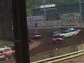A stock car race at Owlerton Stadium,Sheffield.