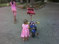 Haasini Playing with tricycle
