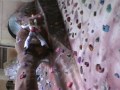 This is Natalie Jordan-Rogers (aged 8) climbing at the Kendal Climbing Wall.