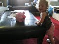 Maddy Pulls Up on the Coffeetable!