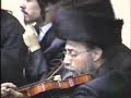 Bobov Chassidim playing violins Bobov Chassidim playing violins