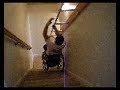 Wheelchair handrail invention used going down stairs
