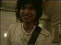 dian testing his guitar
