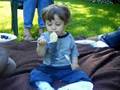 Jonah eating bread with a spoon