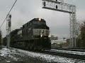 NS 507 passes H49 with an SW1500 under the signals