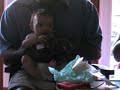 Jaiya watches her gifts being opened