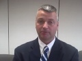 tim robinson was named the hamilton high school head basketball coach friday, may 30, 2008. he talks with steve vaughn shortly after the school board meeting