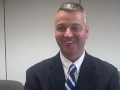 tim robinson was named the hamilton high school head basketball coach friday, may 30, 2008. he talks with steve vaughn shortly after the school board meeting