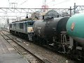 Japanese Freight Trains EF64-1000 and Oli tank Cars.