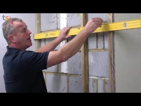 how to fasten plasterboard to brick