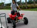 stuntin on my banshee, just a little ride down the block side way at very slow speed, nothing crazy cause i have respect for my area, new clips will be up how i really ride for all the negative commenters.