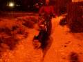 James and Oakley scootering in the snow
