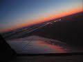 Cherokee Six landing at Moosonee after sunset.
