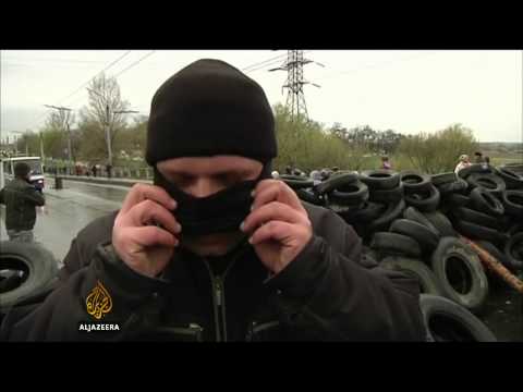 Ukraine's president urges gunmen to lay down weapons