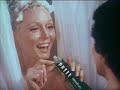 Game show host Bert Convy featured in 1970s Prell commercial. Prell in green tube.