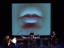 word power
for tenor-sax, keyboard, percussion, bass guitar, live audio & video manipulation (2008).
in word power, the transition between human primal sounds, spoken language and written text is analysed - in that order.
the interactive video presents spoken words in text and audio. it functions like a rapper who fuses the musical gestures of the players with the expression of the words by acting directly upon the sound of the ensemble.
the chosen words are describing conditions of key importance to human survival. towards the end of the piece, they are arranged into a sentence stressing the power of language - issuing a warning about the potential dangers that come with unlimited freedom of speech. since the assassination by a muslim extremist of the dutch film maker theo van gogh - who publicly aired highly controversial ideas about the islam - this has been a much discussed topic in the dutch media.
on a micro level, there is space for improvisation, especially in the domain of rhythm, while the random order of the spoken words delivers a different syntax with every performance.

word power was commissioned by the dutch arts council.
performed by loos: peter van bergen, tenor saxophone/ gerard bouwhuis, piano / johan faber, percussion / jan-bas bollen, bass guitar, video control.
live recording (world premiere) 15 march 2008, theater aan het spui, the hague, netherlands