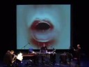 word power
for tenor-sax, keyboard, percussion, bass guitar, live audio & video manipulation (2008).
in word power, the transition between human primal sounds, spoken language and written text is analysed - in that order.
the interactive video presents spoken words in text and audio. it functions like a rapper who fuses the musical gestures of the players with the expression of the words by acting directly upon the sound of the ensemble.
the chosen words are describing conditions of key importance to human survival. towards the end of the piece, they are arranged into a sentence stressing the power of language - issuing a warning about the potential dangers that come with unlimited freedom of speech. since the assassination by a muslim extremist of the dutch film maker theo van gogh - who publicly aired highly controversial ideas about the islam - this has been a much discussed topic in the dutch media.
on a micro level, there is space for improvisation, especially in the domain of rhythm, while the random order of the spoken words delivers a different syntax with every performance.

word power was commissioned by the dutch arts council.
performed by loos: peter van bergen, tenor saxophone/ gerard bouwhuis, piano / johan faber, percussion / jan-bas bollen, bass guitar, video control.
live recording (world premiere) 15 march 2008, theater aan het spui, the hague, netherlands