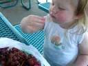 jaqlyn at farmers market eating grapes and drinking lemonade