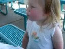jaqlyn at farmers market eating grapes and drinking lemonade