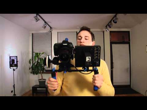 Redrock Micro - Jonah Rubash demonstrates how to assemble and utilize our Redrock DSLR Field Deluxe Bundle. In this video we mount a Canon 5Dmkii, a Canon T2i, and a Panason...