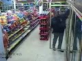 American cop dancing in a shop