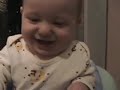 giggling-baby-laughs-at-paper.html