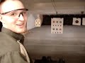 Sig P228, 9mm in brief action at the shooting range.