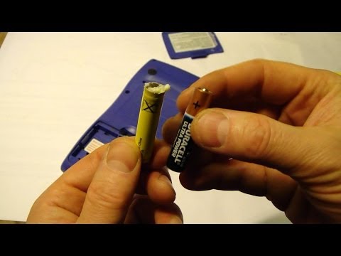 how to clean battery leak in toy