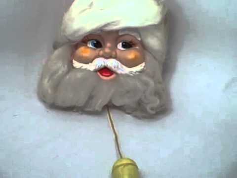 antique Toys 1950's - Available at www.CONNECTIBLES.net. 1950's original MUSICAL SANTA in box, vinyl mask face pull string toy. Hang on wall, plays JINGLE BELLS. Angel hair beard,...