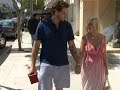 Tori Spelling and Dean McDermott chat as they stroll through Beverly Hills.