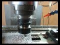 Milltronics CNC Mill in operation milling a 1
