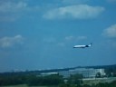 A United Airlines jet lands at Dulles Intl Airport