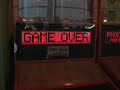 dom getting beat up by tara, then shooting some hoops at the arcade at lambeau field
