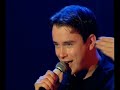 Stephen Gately from Boyzone singing...