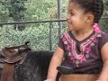 her first pony ride