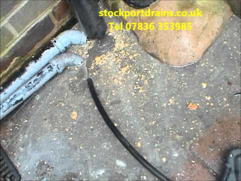 how to unblock outside drain uk